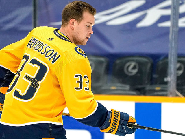 NASHVILLE, TN - APRIL 13: Viktor Arvidsson #33 of the Nashville Predators skates in warm-ups prior to the game against the Tampa Bay Lightning at Bridgestone Arena on April 13, 2021 in Nashville, Tennessee.