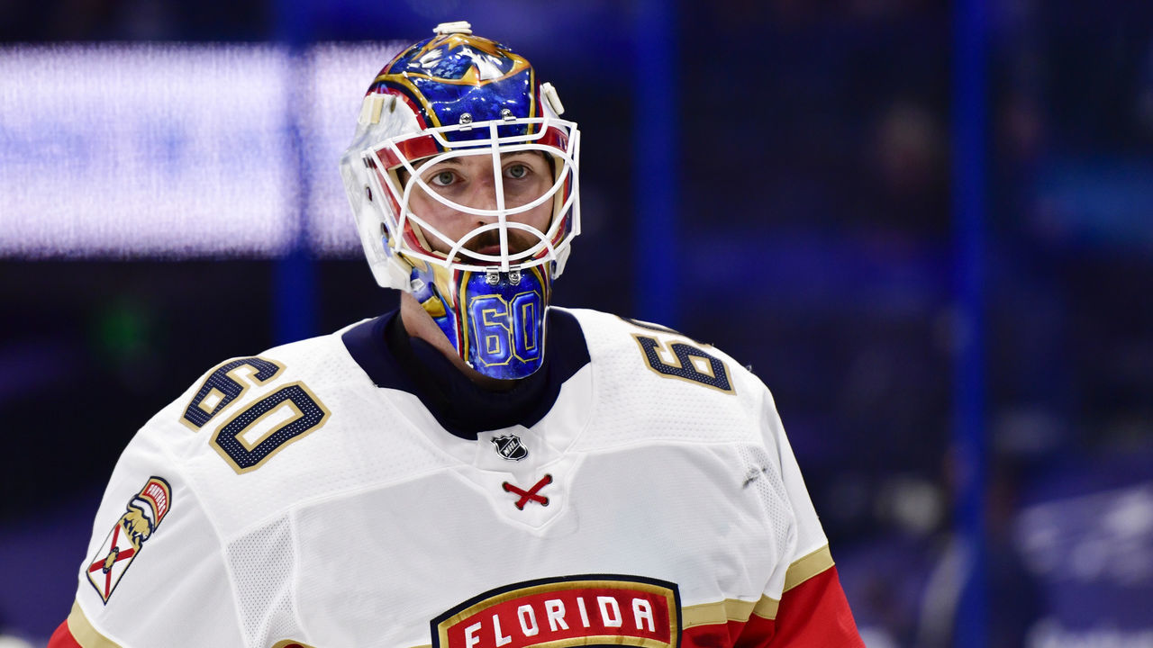 TAMPA, FLORIDA - APRIL 15: Chris Driedger #60 of the Florida Panthers looks on during the third period against the Tampa Bay Lightning at Amalie Arena on April 15, 2021 in Tampa, Florida.