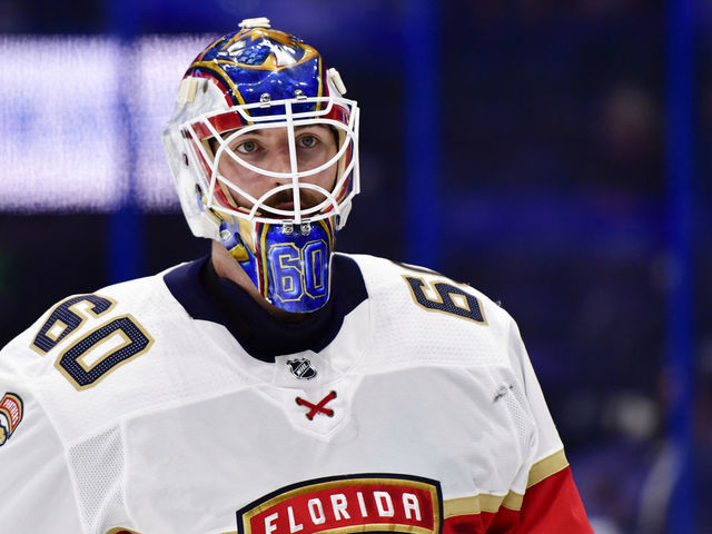 TAMPA, FLORIDA - APRIL 15: Chris Driedger #60 of the Florida Panthers looks on during the third period against the Tampa Bay Lightning at Amalie Arena on April 15, 2021 in Tampa, Florida.