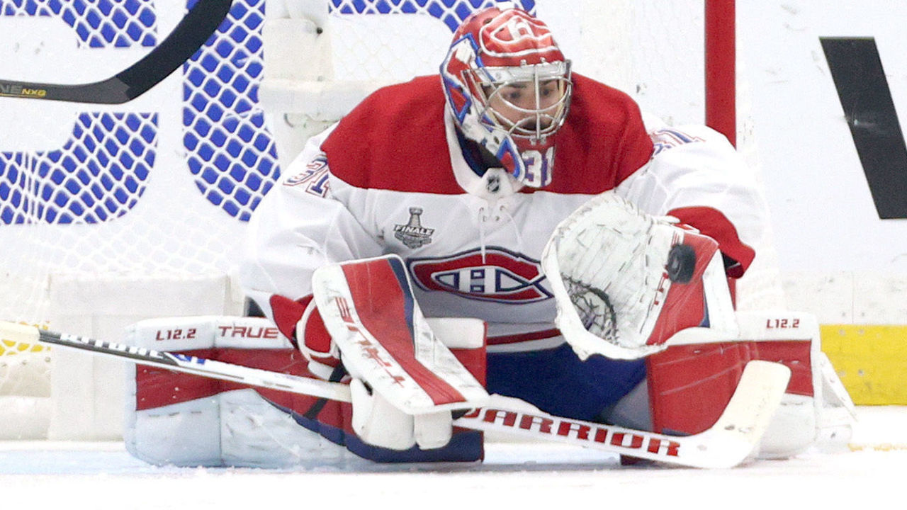 TAMPA, FLORIDA - JULY 07: Goaltender Carey Price #31 of the Montreal Canadiens makes a blocker save during the first period of Game Five of the 2021 Stanley Cup Final against the Tampa Bay Lightning at Amalie Arena on July 07, 2021 in Tampa, Florida.