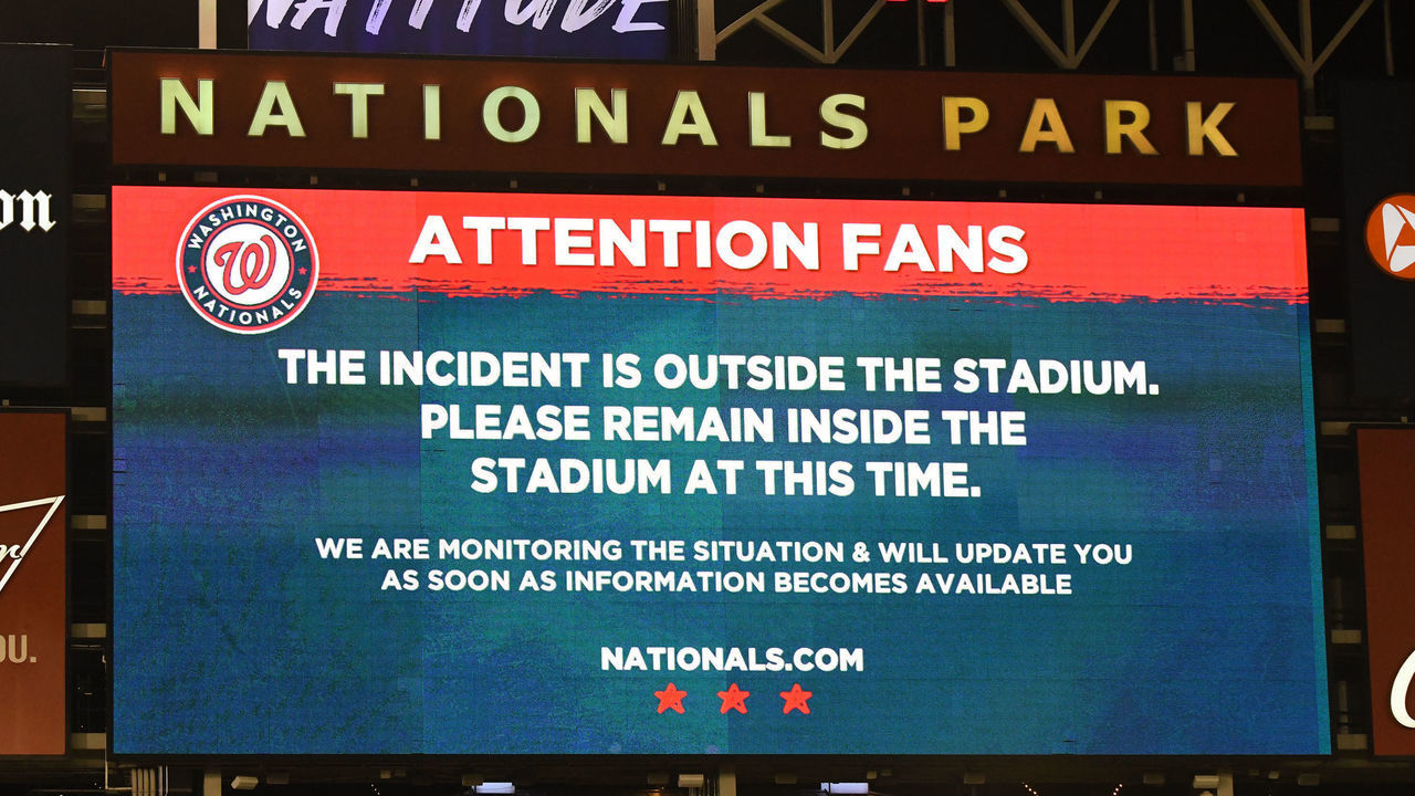 WASHINGTON, DC - JULY 17: Sign on scoreboard after what is believed to be shots were heard outside the stadium during a baseball game between the San Diego Padres and the Washington Nationals at Nationals Park on July 17, 2021 in Washington, DC.