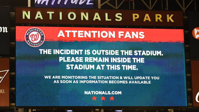 WASHINGTON, DC - JULY 17: Sign on scoreboard after what is believed to be shots were heard outside the stadium during a baseball game between the San Diego Padres and the Washington Nationals at Nationals Park on July 17, 2021 in Washington, DC.
