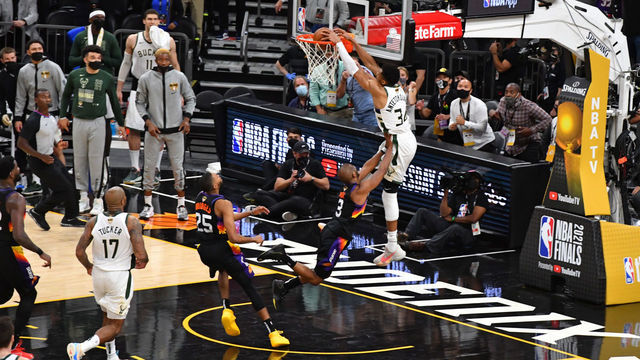 PHOENIX, AZ - JULY 17: Giannis Antetokounmpo #34 of the Milwaukee Bucks dunks the ball against the Phoenix Suns during Game Five of the 2021 NBA Finals on July 17, 2021 at Footprint Center in Phoenix, Arizona. NOTE TO USER: User expressly acknowledges and agrees that, by downloading and/or using this Photograph, user is consenting to the terms and conditions of the Getty Images License Agreement. Mandatory Copyright Notice: Copyright 2021 NBAE