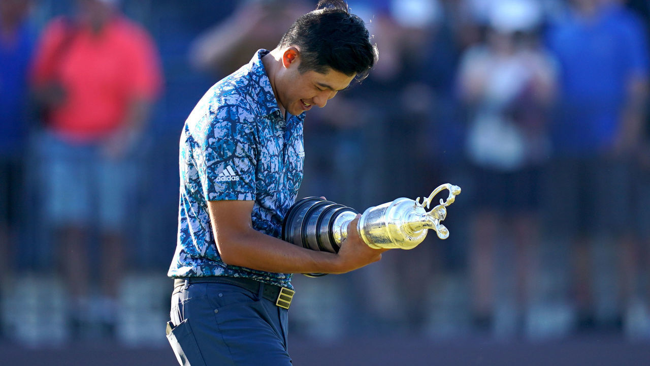 USA's Collin Morikawa celebrates with the Claret Jug Trophy after winning The Open at The Royal St George's Golf Club in Sandwich, Kent. Picture date: Sunday July 18, 2021.