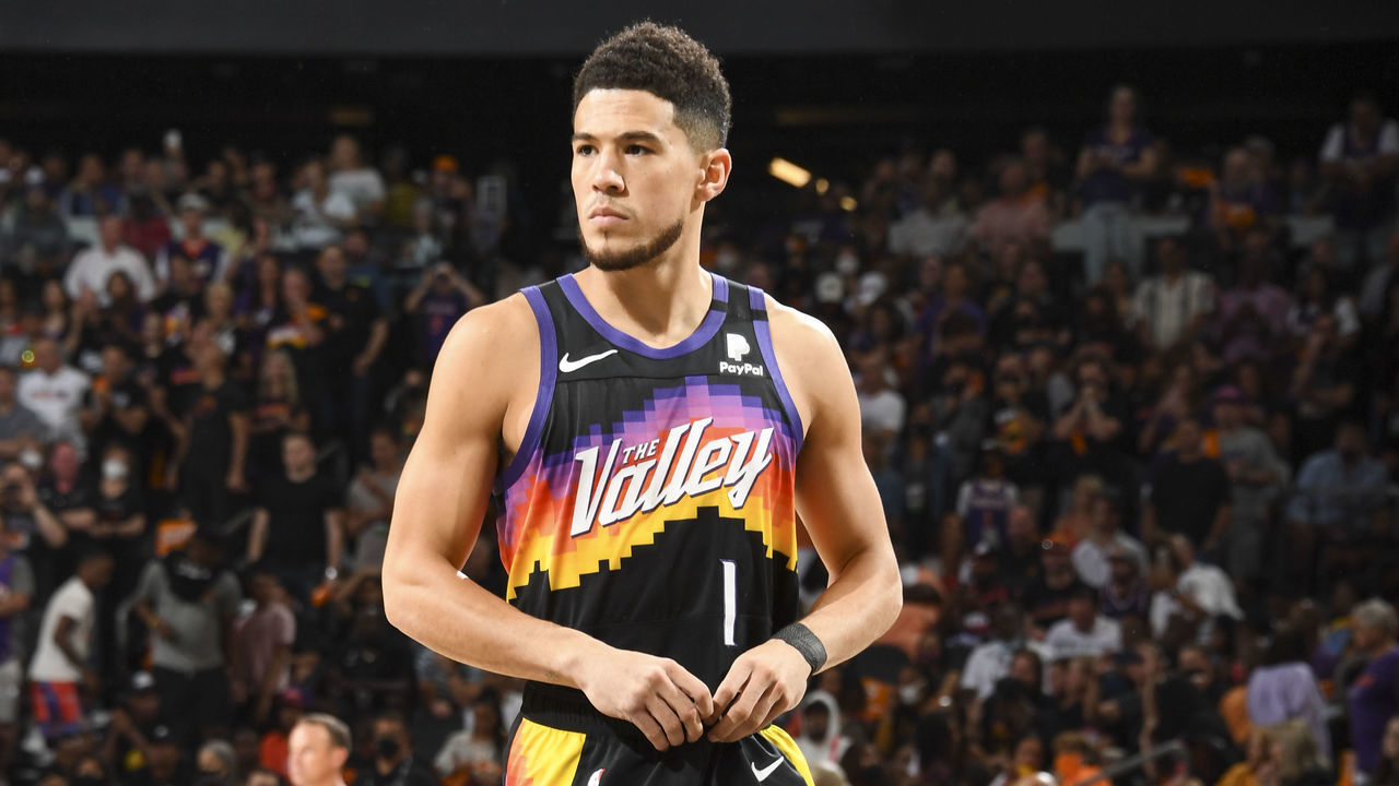 PHOENIX, AZ - JULY 17: Devin Booker #1 of the Phoenix Suns looks on before the game against the Milwaukee Bucks during Game Five of the 2021 NBA Finals on July 17, 2021 at Footprint Center in Phoenix, Arizona. Mandatory Copyright Notice: Copyright 2021 NBAE