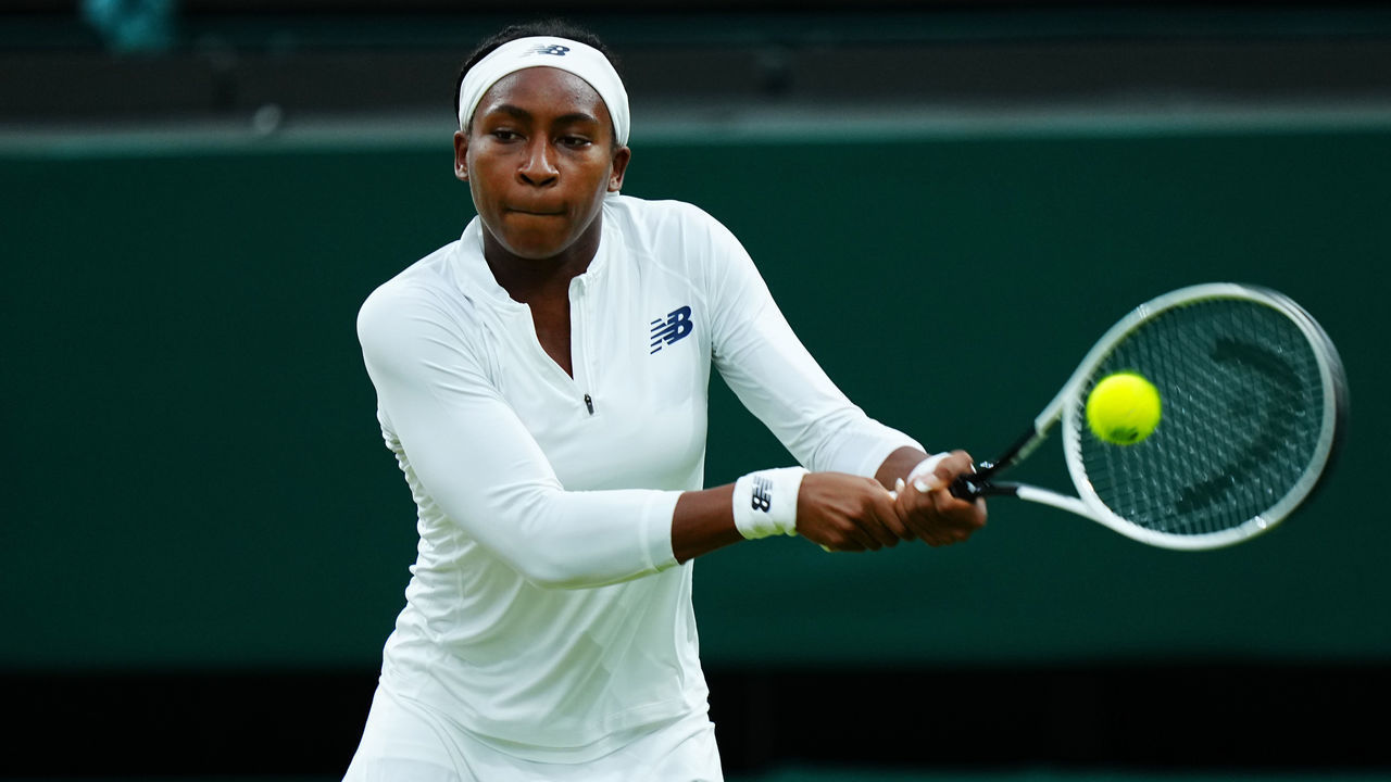 LONDON, ENGLAND - JULY 06: Coco Gauff of The United States, playing partner of Caty McNally of The United States plays a backhand in their Ladies' Doubles Third Round match against Veronika Kudermetova and Elena Vesnina of Russia during Day Eight of The Championships - Wimbledon 2021 at All England Lawn Tennis and Croquet Club on July 06, 2021 in London, England.