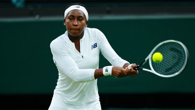 LONDON, ENGLAND - JULY 06: Coco Gauff of The United States, playing partner of Caty McNally of The United States plays a backhand in their Ladies' Doubles Third Round match against Veronika Kudermetova and Elena Vesnina of Russia during Day Eight of The Championships - Wimbledon 2021 at All England Lawn Tennis and Croquet Club on July 06, 2021 in London, England.