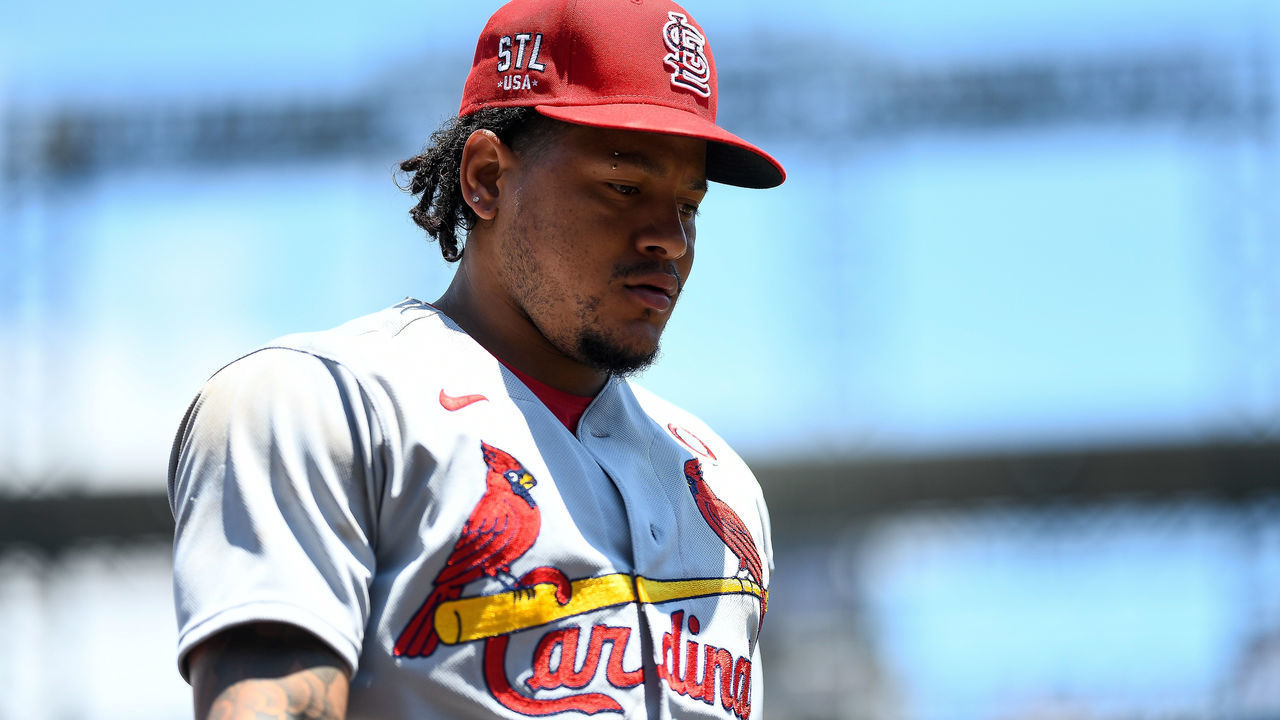 DENVER, CO - JULY 04: Carlos Martinez #18 of the St. Louis Cardinals walks to the dugout before a game against the Colorado Rockies at Coors Field on July 4, 2021 in Denver, Colorado.