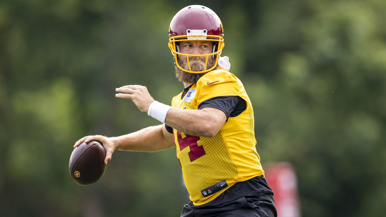 ASHBURN, VA - JUNE 08: Ryan Fitzpatrick #14 of the Washington Football Team looks to pass during minicamp at Inova Sports Performance Center on June 8, 2021 in Ashburn, Virginia.