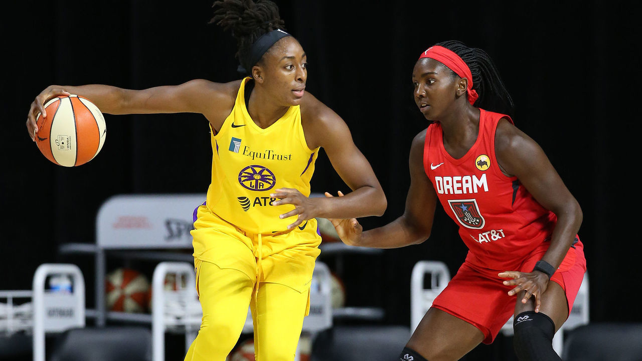 Orlando, FL - AUGUST 21: Nneka Ogwumike #30 of the Los Angeles Sparks drives to the basket past Elizabeth Williams #1 of the Atlanta Dream on August 21, 2020 at the Feld Entertainment Center in Palmetto, Florida. NOTE TO USER: User expressly acknowledges and agrees that, by downloading and/or using this Photograph, user is consenting to the terms and conditions of the Getty Images License Agreement. Mandatory Copyright Notice: Copyright 2020 NBAE