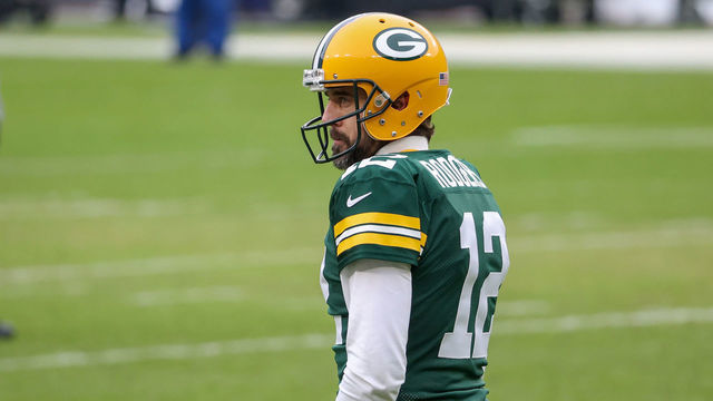 GREEN BAY, WISCONSIN - JANUARY 24: Aaron Rodgers #12 of the Green Bay Packers warms up before the NFC Championship game against the Tampa Bay Buccaneers at Lambeau Field on January 24, 2021 in Green Bay, Wisconsin.