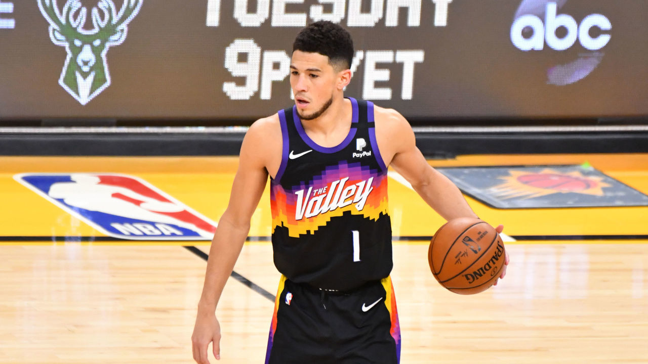 PHOENIX, AZ - JULY 17: Devin Booker #1 of the Phoenix Suns handles the ball against the Milwaukee Bucks during Game Five of the 2021 NBA Finals on July 17, 2021 at Footprint Center in Phoenix, Arizona. NOTE TO USER: User expressly acknowledges and agrees that, by downloading and/or using this Photograph, user is consenting to the terms and conditions of the Getty Images License Agreement. Mandatory Copyright Notice: Copyright 2021 NBAE