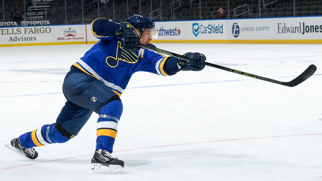 ST. LOUIS, MO - APRIL 9: Vladimir Tarasenko #91 of the St. Louis Blues takes a shot against the Minnesota Wild on April 9, 2021 at the Enterprise Center in St. Louis, Missouri.