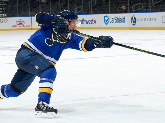 ST. LOUIS, MO - APRIL 9: Vladimir Tarasenko #91 of the St. Louis Blues takes a shot against the Minnesota Wild on April 9, 2021 at the Enterprise Center in St. Louis, Missouri.