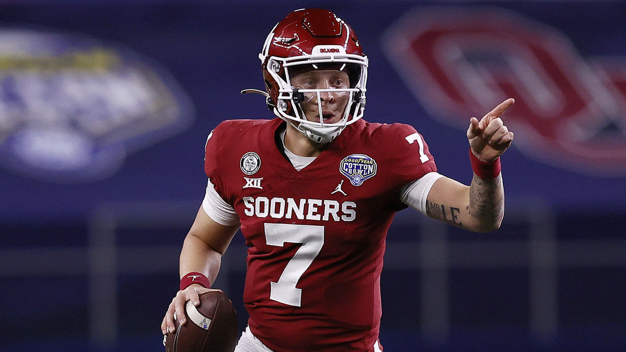 ARLINGTON, TEXAS - DECEMBER 30: Quarterback Spencer Rattler #7 of the Oklahoma Sooners scrambles against the Florida Gators during the second quarter at AT&T Stadium on December 30, 2020 in Arlington, Texas.
