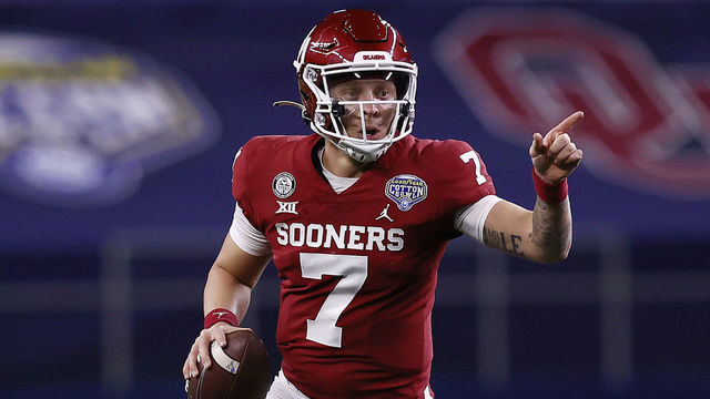 ARLINGTON, TEXAS - DECEMBER 30: Quarterback Spencer Rattler #7 of the Oklahoma Sooners scrambles against the Florida Gators during the second quarter at AT&T Stadium on December 30, 2020 in Arlington, Texas.
