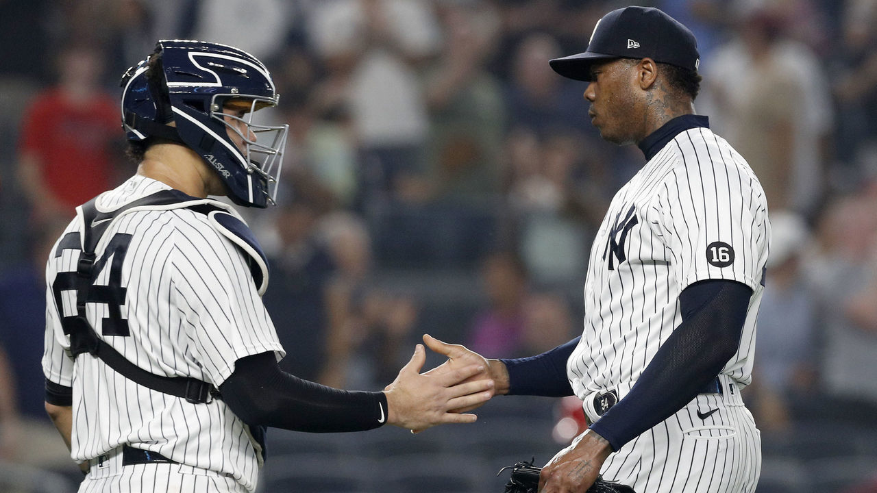 NEW YORK, NEW YORK - JULY 20: Aroldis Chapman #54 and Gary Sanchez #24 of the New York Yankees celebrate after defeating the Philadelphia Phillies at Yankee Stadium on July 20, 2021 in New York City.