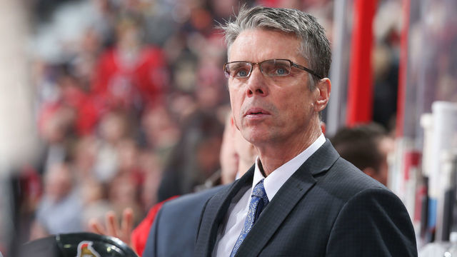 OTTAWA, ON - NOVEMBER 16: Head coach Dave Cameron of the Ottawa Senators looks on from behind the bench during an NHL game against the Detroit Red Wings at Canadian Tire Centre on November 16, 2015 in Ottawa, Ontario, Canada.