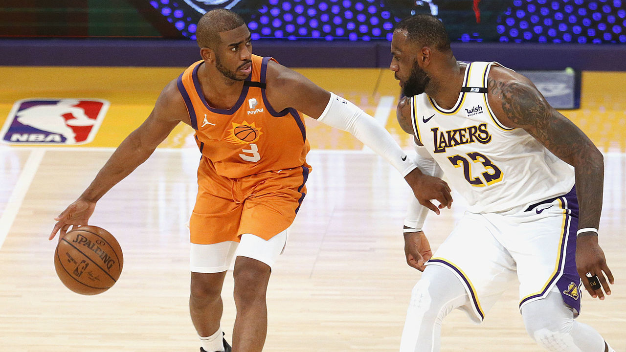 LOS ANGELES, CA - MAY 30: Los Angeles Lakers forward LeBron James (23) guards Phoenix Suns guard Chris Paul (3) late in the fourth quarter at the Staples Center on Sunday, May 30, 2021 in Los Angeles, CA. Game four of the NBA Western Conference first-round playoff series. Lakers lost 100-92. (Gary Coronado / Los Angeles Times via Getty Images)
