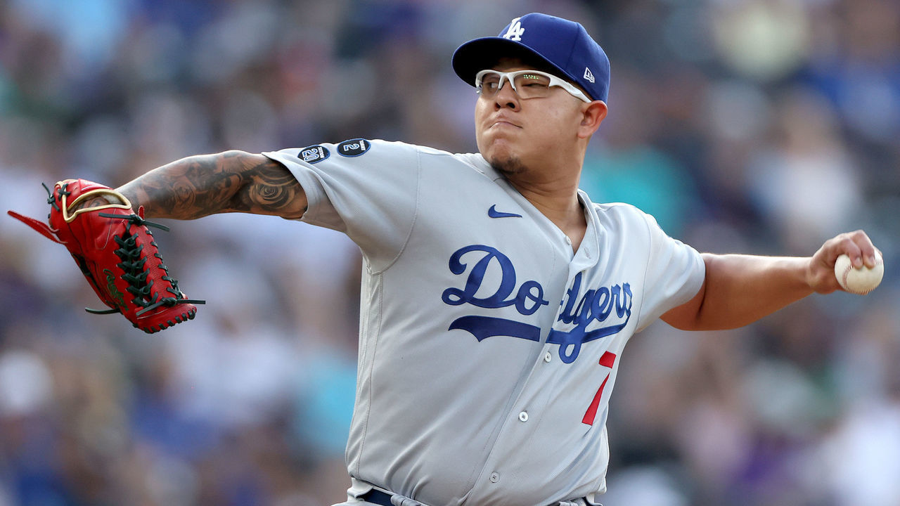 DENVER, COLORADO - JULY 16: Starting pitcher Julio Urias #7 of the Los Angeles Dodgers throws against the Colorado Rockies in the first inning at Coors Field on July 16, 2021 in Denver, Colorado.