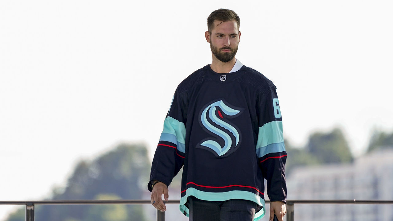 SEATTLE, WASHINGTON - JULY 21: Chris Driedger is introduced after being drafted by the Seattle Kraken during the 2021 NHL Expansion Draft at Gas Works Park on July 21, 2021 in Seattle, Washington. The Kracken is the National Hockey League's newest franchise and will begin play in October 2021.