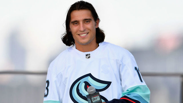 SEATTLE, WASHINGTON - JULY 21: Chris Tanev is interviewed after being drafted by the Seattle Kraken during the 2021 NHL Expansion Draft at Gas Works Park on July 21, 2021 in Seattle, Washington. The Kracken is the National Hockey League's newest franchise and will begin play in October 2021.