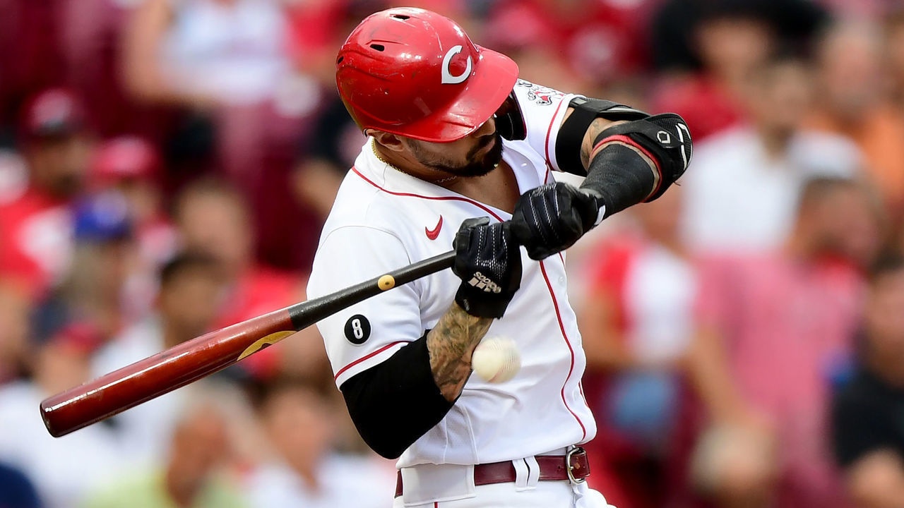 CINCINNATI, OHIO - JULY 16: Nick Castellanos #2 of the Cincinnati Reds is hit by a pitch during a game between the Milwaukee Brewers and Cincinnati Reds at Great American Ball Park on July 16, 2021 in Cincinnati, Ohio.