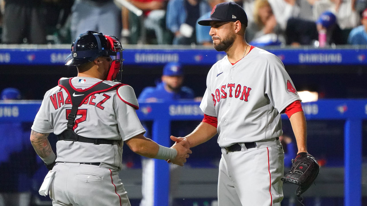 BUFFALO, NY - JULY 21: Matt Barnes #32 of the Boston Red Sox celebrates with Christian Vazquez #7 after beating the Toronto Blue Jays at Sahlen Field on July 21, 2021 in Buffalo, New York.