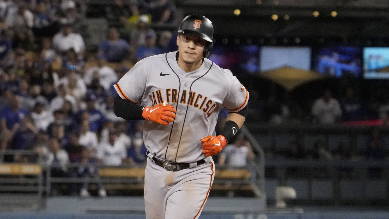 Los Angeles, CA - July 21: Wilmer Flores #41 of the San Francisco Giants rounds second base after hitting a two run home run against the Los Angeles Dodgers in the ninth inning of a baseball game at Dodger Stadium in Los Angeles on Wednesday, July 21, 2021.