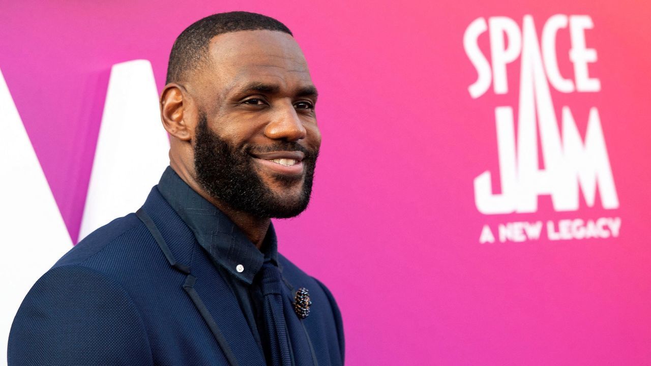 TOPSHOT - Basketball player/actor LeBron James arrives at the Warner Bros Pictures world premiere of "Space Jam: A New Legacy" at the Regal LA Live in Los Angeles, California, July 12, 2021.