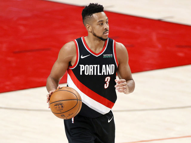 PORTLAND, OREGON - MAY 29: CJ McCollum #3 of the Portland Trail Blazers dribbles against the Denver Nuggets during Round 1, Game 4 of the 2021 NBA Playoffs at Moda Center on May 29, 2021 in Portland, Oregon.