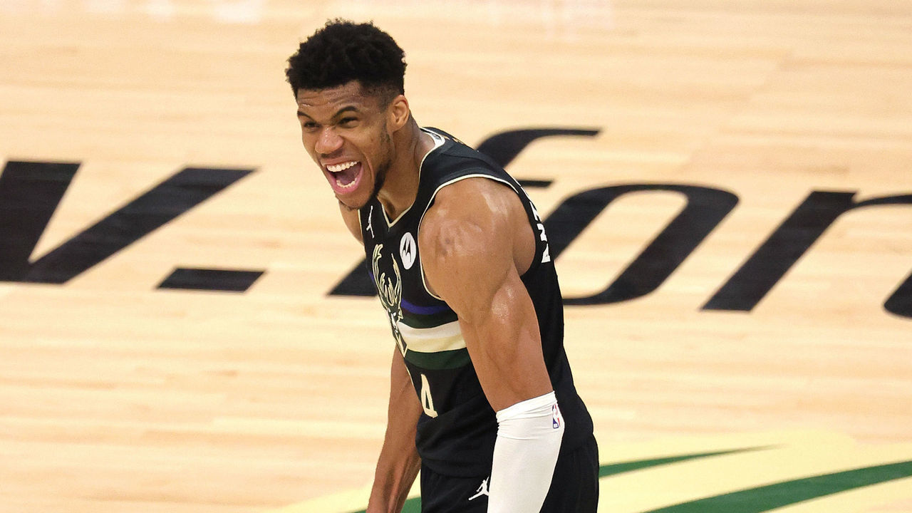MILWAUKEE, WISCONSIN - JULY 20: Giannis Antetokounmpo #34 of the Milwaukee Bucks celebrates after defeating the Phoenix Suns in Game Six to win the 2021 NBA Finals at Fiserv Forum on July 20, 2021 in Milwaukee, Wisconsin.