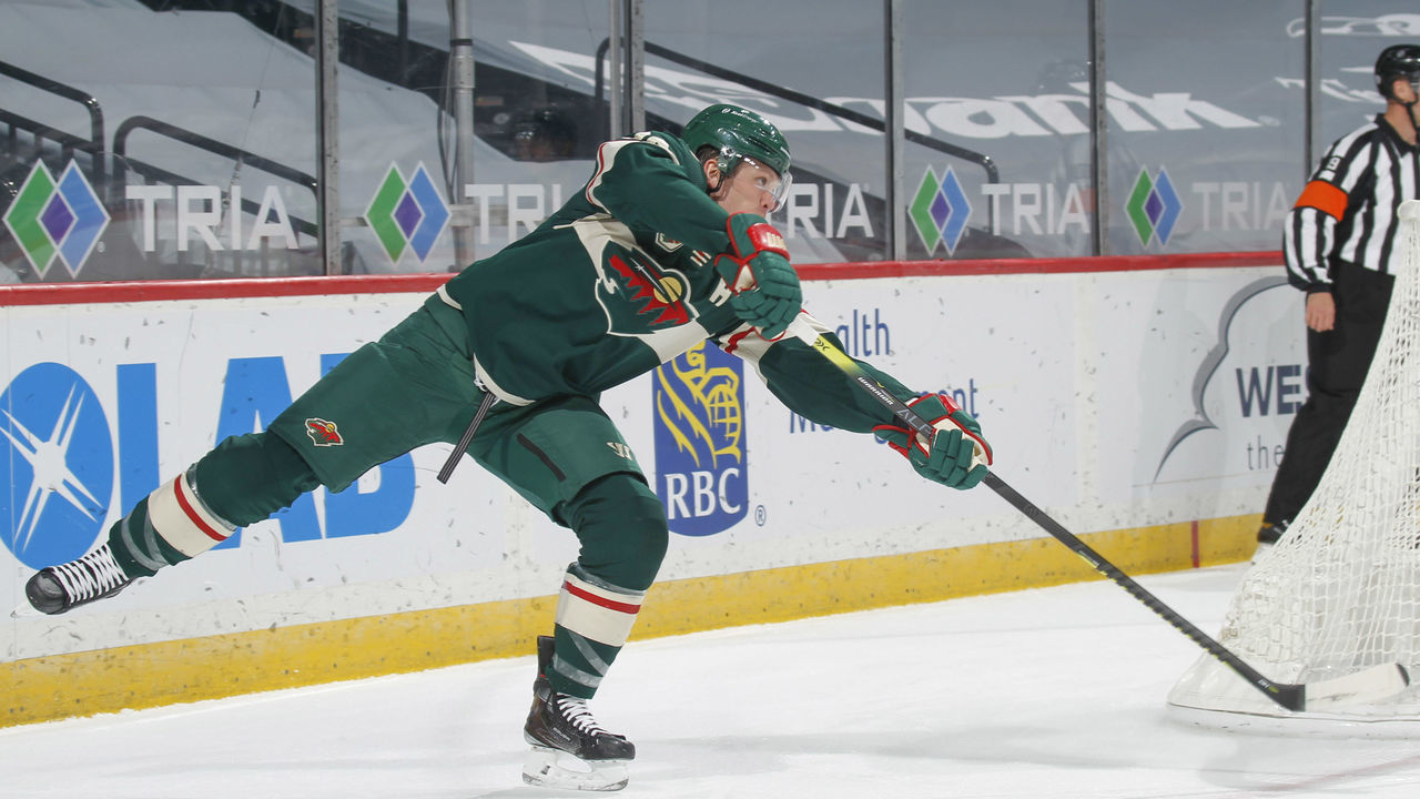 SAINT PAUL, MN - APRIL 16: Ryan Suter #20 of the Minnesota Wild passes the puck against the San Jose Sharks during the game at the Xcel Energy Center on April 16, 2021 in Saint Paul, Minnesota.