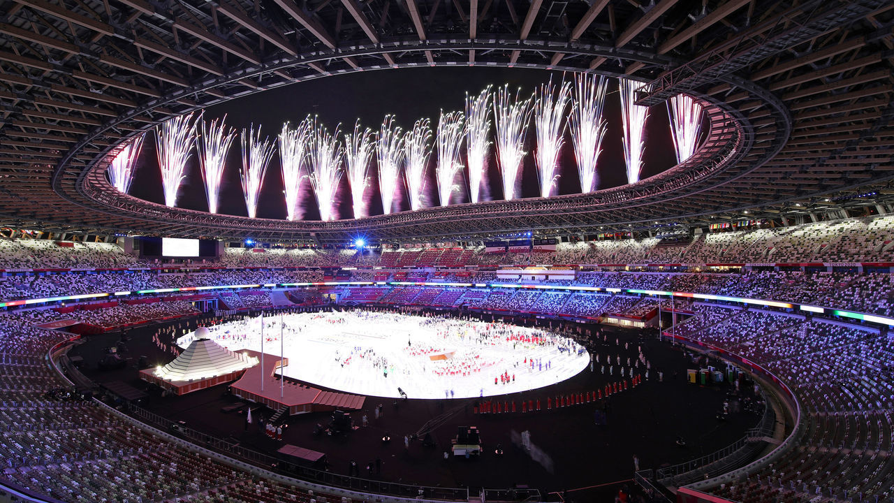 TOKYO, JAPAN - JULY 23: Fireworks explode during the Opening Ceremony of the Tokyo 2020 Olympic Games at Olympic Stadium on July 23, 2021 in Tokyo, Japan.