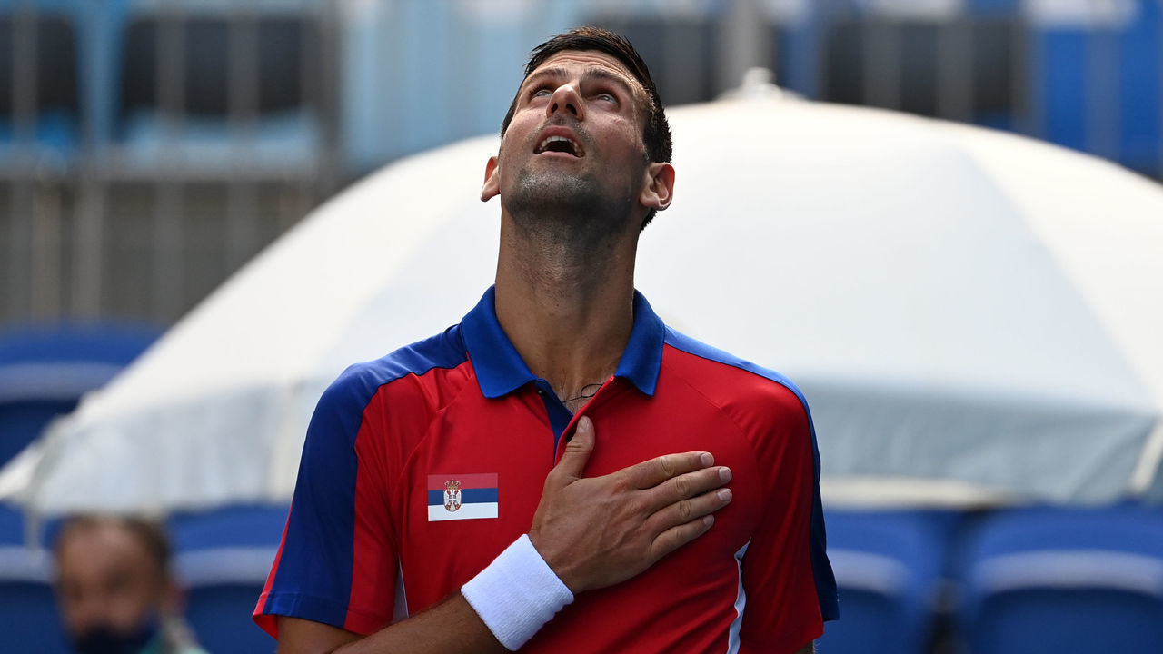 24 July 2021, Japan, Tokio: Tennis: Olympics, men's singles, 1st round, Djokovic (Serbia) - Dellien (Bolivia), at Ariake Tennis Park. Novak Djokovic reacts after the match ended. He the singles with 6:2, 6:2 against Dellien. Photo: Marijan Murat/dpa
