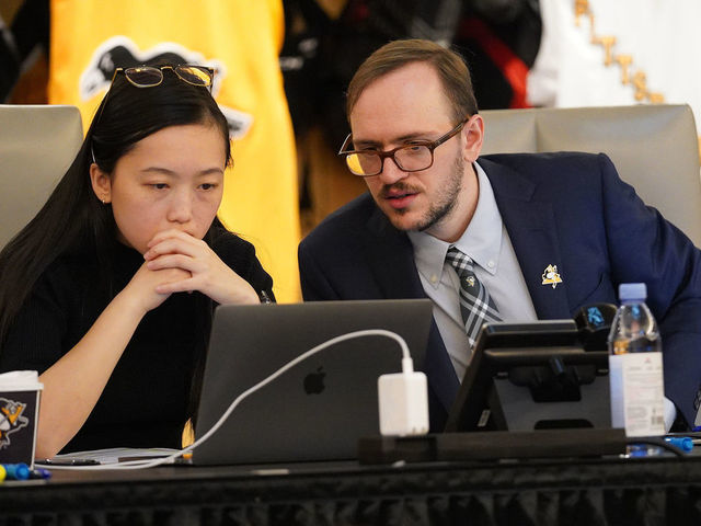 PITTSBURGH, PA - JULY 24: (L-R) Katerina Wu, Data Scientist, and Nick Citrone, Senior Data Scientist, of the Pittsburgh Penguins attend rounds 2-7 of the 2021 NHL Entry Draft at PPG Paints Arena on July 24, 2021 in Pittsburgh, Pennsylvania.