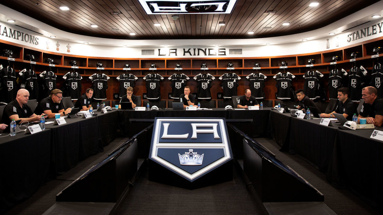 EL SEGUNDO, CALIFORNIA - JULY 23: President Luc Robitaille, Vice President and General Manager Rob Blake, Director of Amateur Scouting Mark Yannetti of the Los Angeles Kings and staff prepare for the first round of the 2021 NHL Entry Draft at Toyota Sports Performance Center on July 23, 2021 in El Segundo, California.