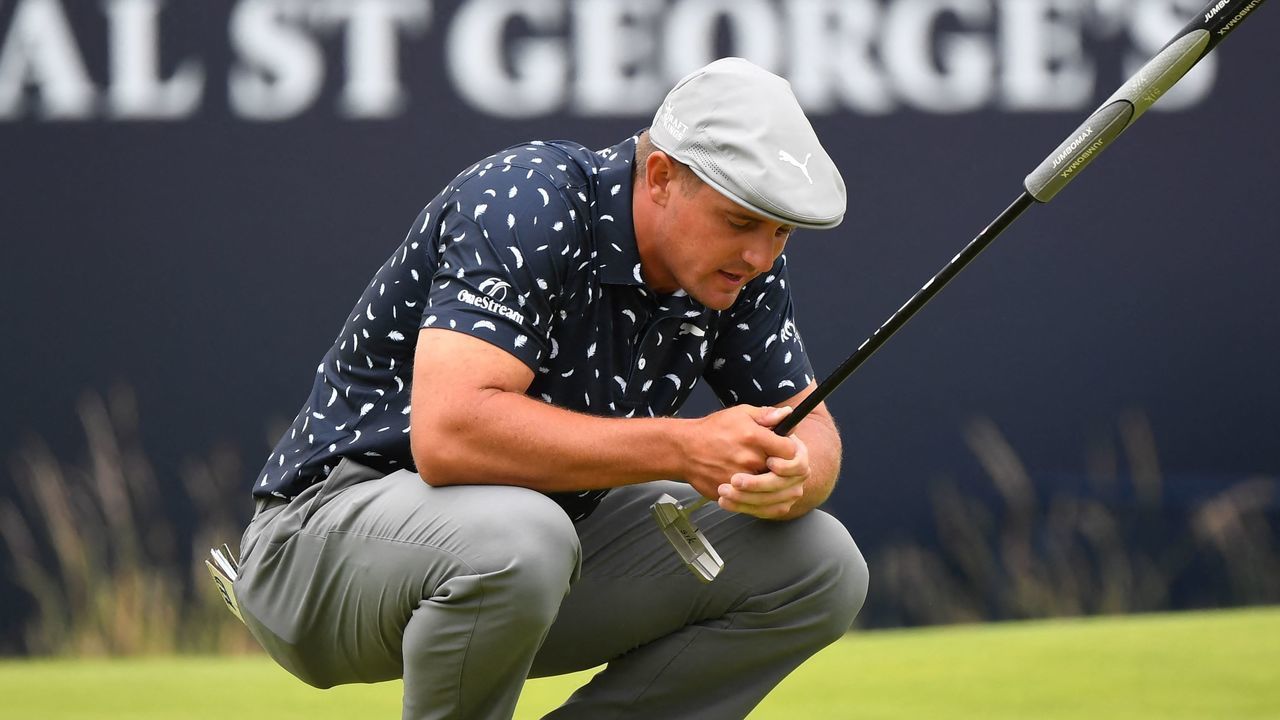 US golfer Bryson DeChambeau waits to putt on the 18th green during his first round on day one of The 149th British Open Golf Championship at Royal St George's, Sandwich in south-east England on July 15, 2021. - RESTRICTED TO EDITORIAL USE