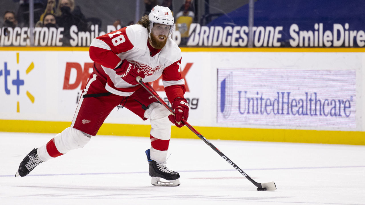 NASHVILLE, TN - MARCH 23: Marc Staal #18 of the Detroit Red Wings skates the puck up ice against the Nashville Predators during the second period at Bridgestone Arena on March 23, 2021 in Nashville, Tennessee.