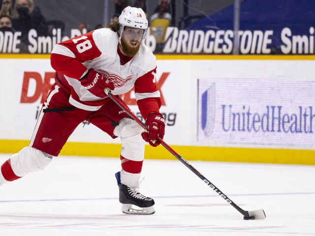 NASHVILLE, TN - MARCH 23: Marc Staal #18 of the Detroit Red Wings skates the puck up ice against the Nashville Predators during the second period at Bridgestone Arena on March 23, 2021 in Nashville, Tennessee.