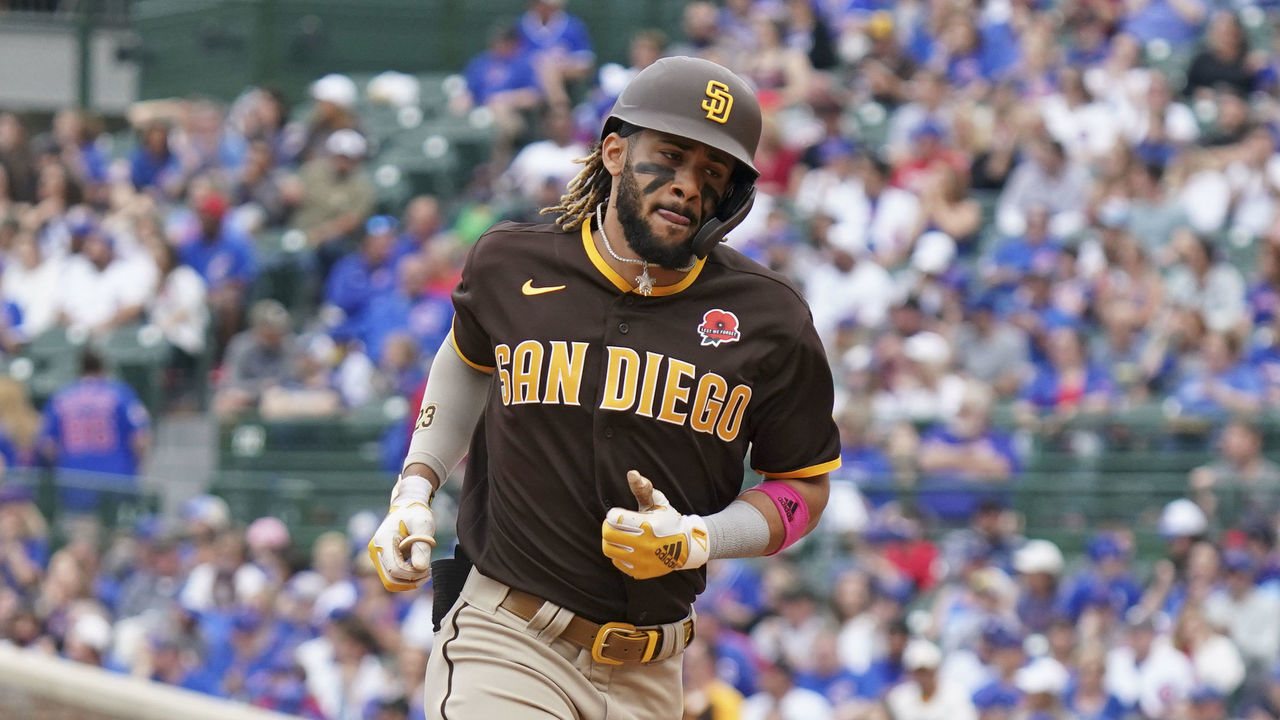 CHICAGO, ILLINOIS - MAY 31: Fernando Tatis Jr. #23 of the San Diego Padres hits a home run during the sixth inning of a game against the Chicago Cubs at Wrigley Field on May 31, 2021 in Chicago, Illinois.
