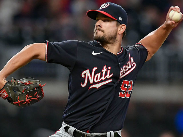 ATLANTA, GA JUNE 01: Washington relief pitcher Brad Hand (52) throws a pitch during the MLB game between the Washington Nationals and the Atlanta Braves on June 1st, 2021 at Truist Park in Atlanta, GA.