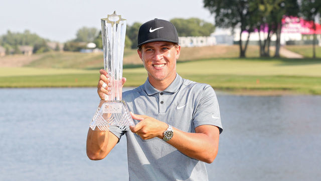 BLAINE, MINNESOTA - JULY 25: Cameron Champ poses with the trophy after winning the 3M Open at TPC Twin Cities on July 25, 2021 in Blaine, Minnesota.