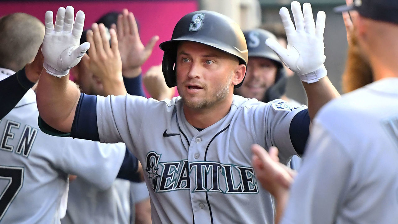 ANAHEIM, CA - JULY 16: Kyle Seager (15) is congratulated after he hit a two run home run in the third inning against the Los Angeles Angels on July 16, 2021 at Angels Stadium in Anaheim, CA.( Photo by John McCoy/Icon Sportswire via Getty Images)
