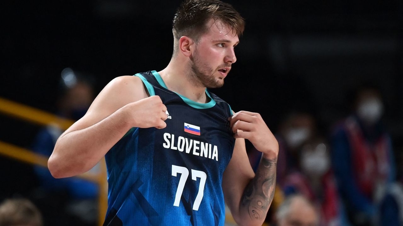 Slovenia's Luka Doncic reacts in the men's preliminary round group C basketball match between Argentina and Slovenia during the Tokyo 2020 Olympic Games at the Saitama Super Arena in Saitama on July 26, 2021.
