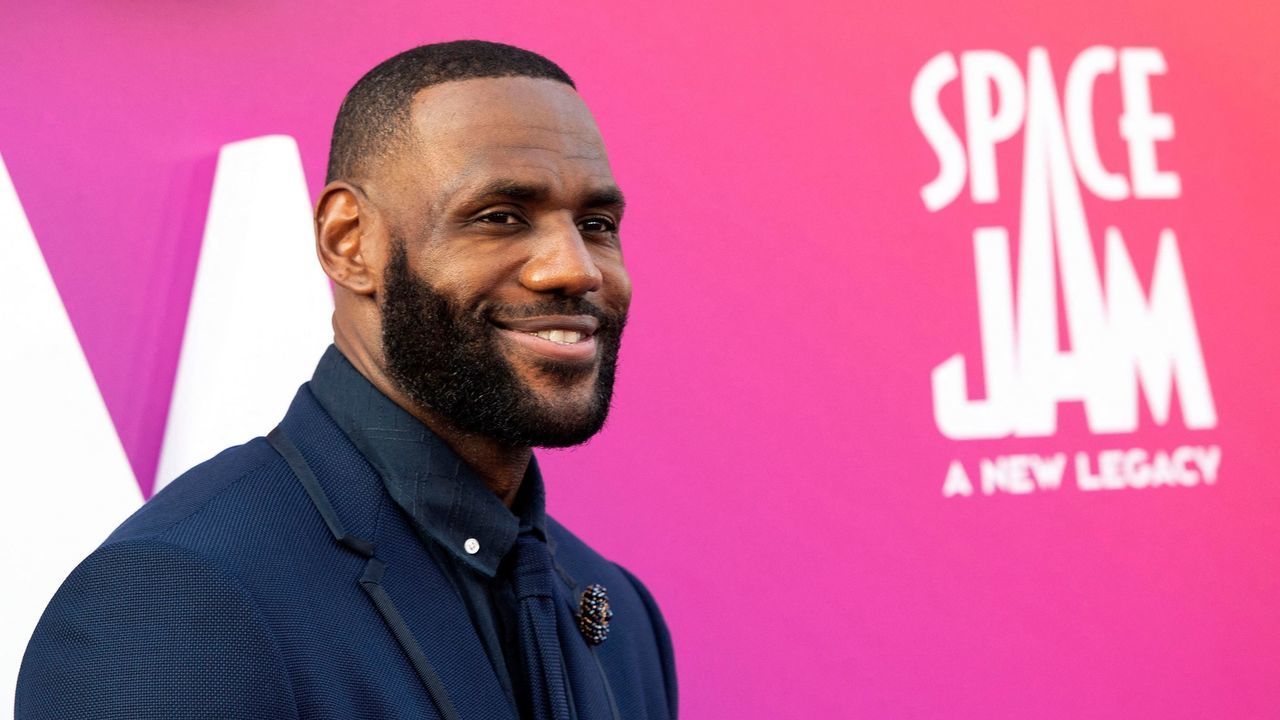 TOPSHOT - Basketball player/actor LeBron James arrives at the Warner Bros Pictures world premiere of "Space Jam: A New Legacy" at the Regal LA Live in Los Angeles, California, July 12, 2021.
