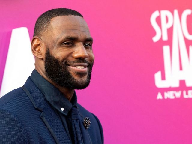 TOPSHOT - Basketball player/actor LeBron James arrives at the Warner Bros Pictures world premiere of "Space Jam: A New Legacy" at the Regal LA Live in Los Angeles, California, July 12, 2021.