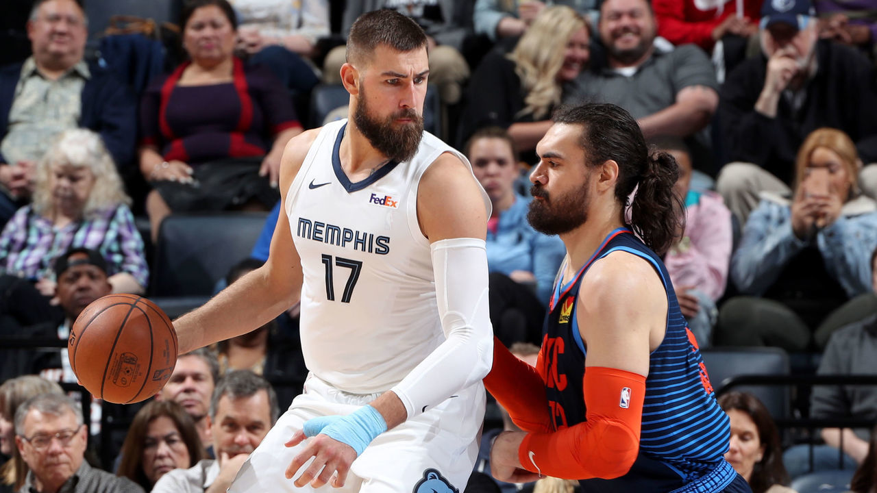 MEMPHIS, TN - MARCH 25: Jonas Valanciunas #17 of the Memphis Grizzlies handles the ball against Steven Adams #12 of the Oklahoma City Thunder on March 25, 2019 at FedExForum in Memphis, Tennessee. NOTE TO USER: User expressly acknowledges and agrees that, by downloading and/or using this photograph, user is consenting to the terms and conditions of the Getty Images License Agreement. Mandatory Copyright Notice: Copyright 2019 NBAE
