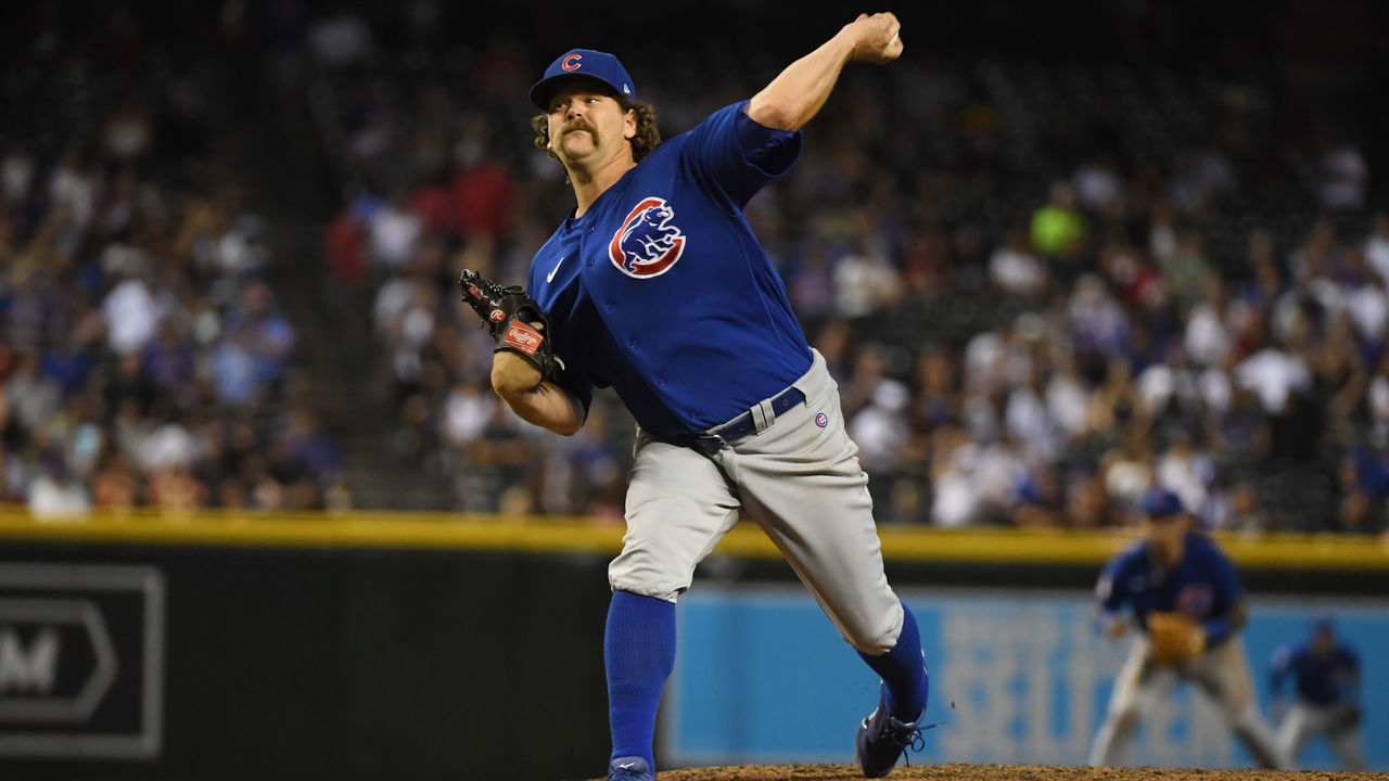 PHOENIX, ARIZONA - JULY 16: Andrew Chafin #39 of the Chicago Cubs delivers a pitch against the Arizona Diamondbacks at Chase Field on July 16, 2021 in Phoenix, Arizona.