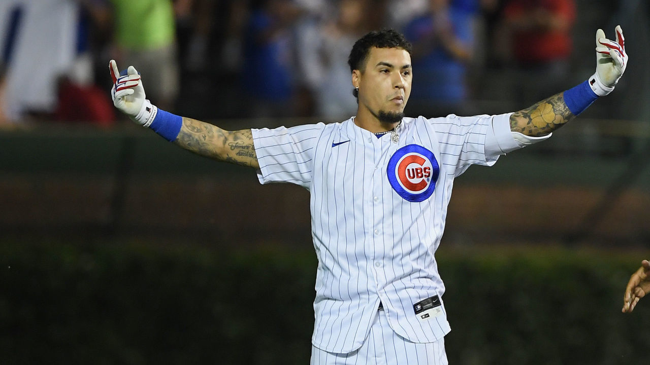 CHICAGO, ILLINOIS - JULY 26: Javier Baez #9 of the Chicago Cubs reacts after his walk off single in the ninth inning against the Cincinnati Reds at Wrigley Field on July 26, 2021 in Chicago, Illinois.